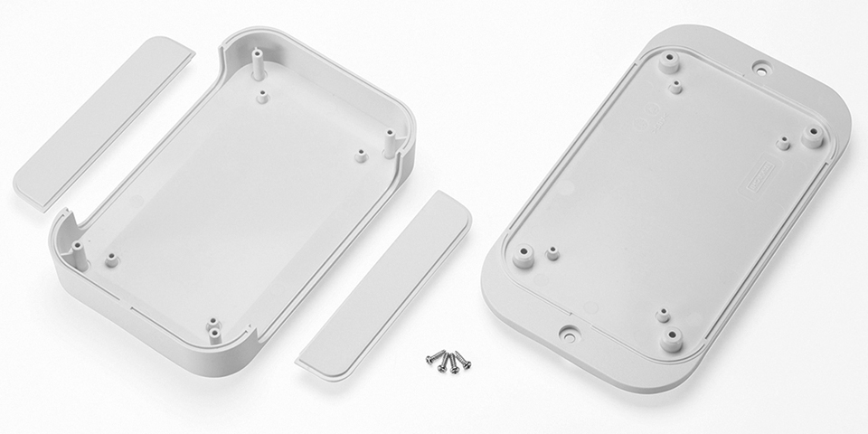 plastic flanged enclosure for compact electronic systems